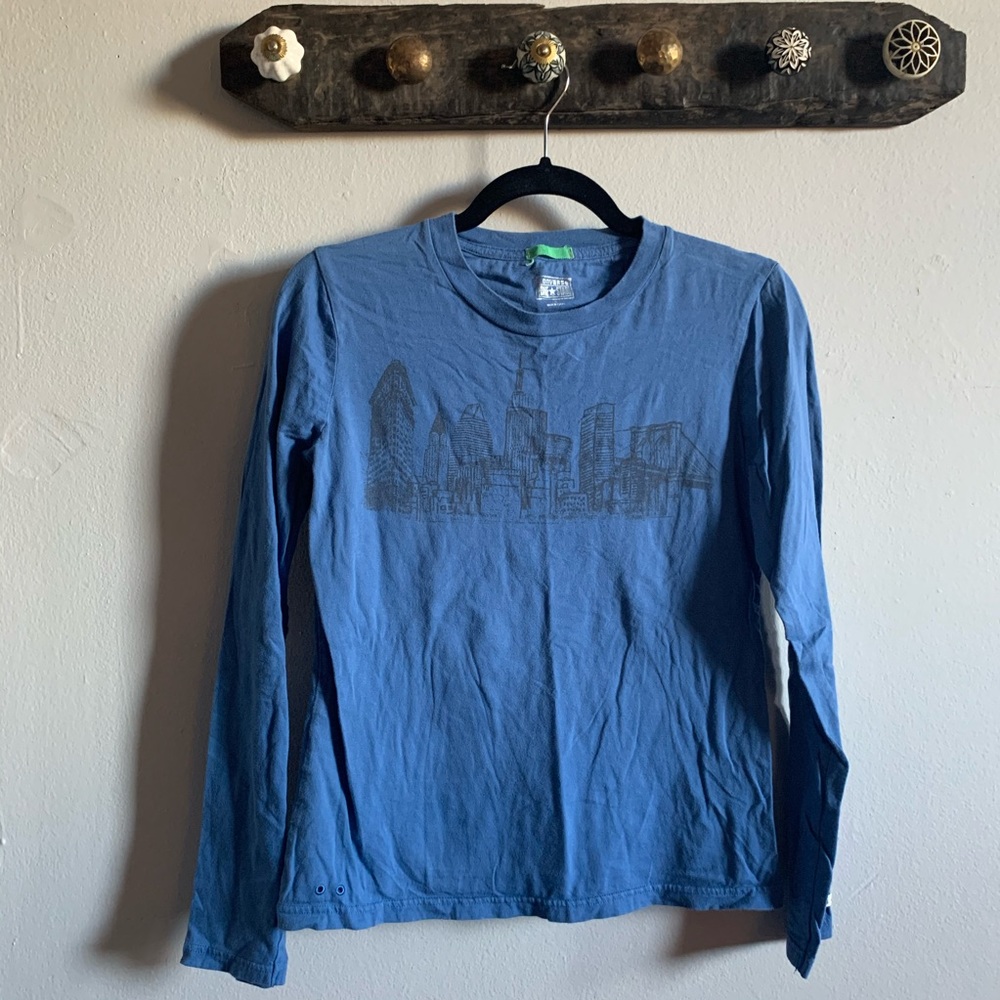 Blue long sleeve cityscape